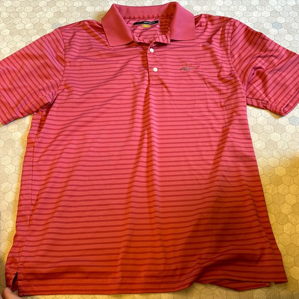 Size large Greg Norman polo shirt pink/salmon color